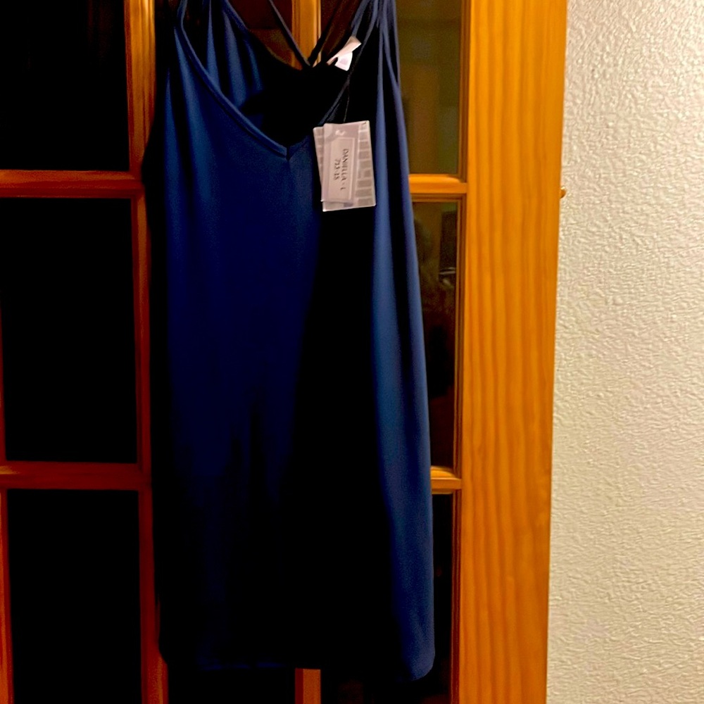 LuLaRoe spruce colored tank top with cross back very pretty just too big